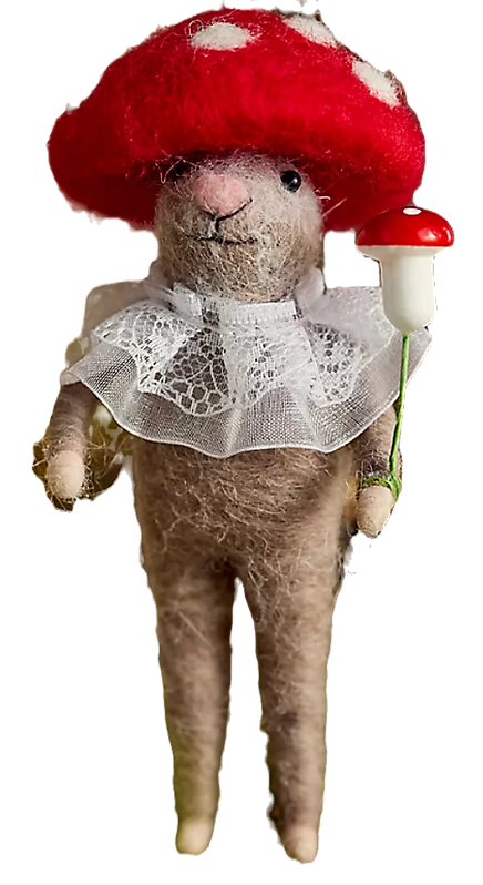 Cozy autumn decor and fall decorating ideas. Seasonal autumn decor like this mushroom mouse felt critter for decor on any bookshelf or tabletop.