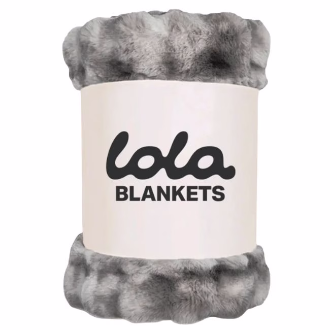 black gray and white lola blanket wrapped in their branding