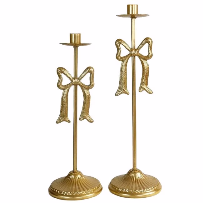 bow candle holders in gold