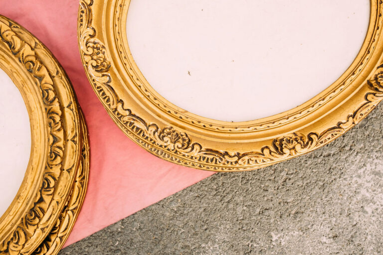 vintage looking mirror with gold trim