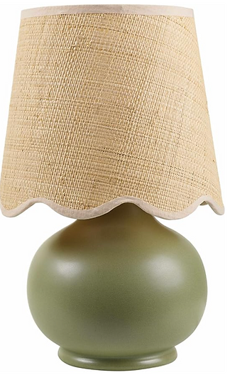small green table lamp with rattan lamp shade with scalloped edges