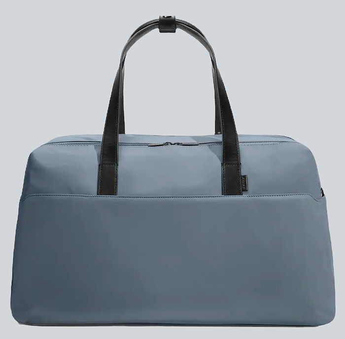 Away Blue Weekender Bag with a Black Top Handle