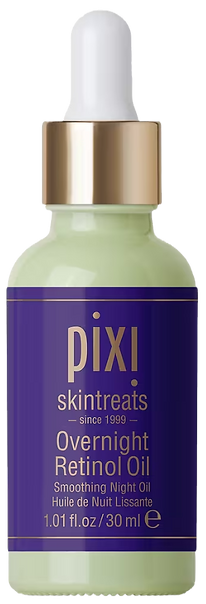 Pixi night oil in a green bottle with a purple lable and a white and gold cap