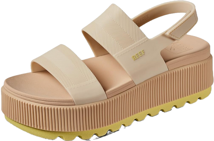 sorel platform sanals in beige with a yellow lug sole