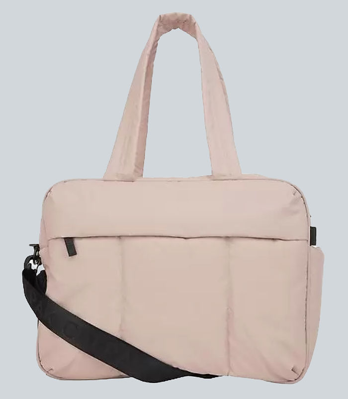 pink weekender bag with a black strap