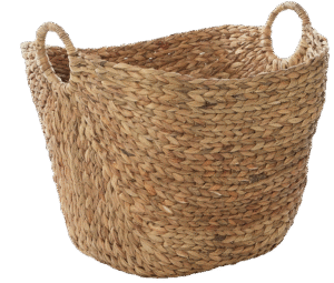 Basket for extra towels and blankets in a guest bedroom