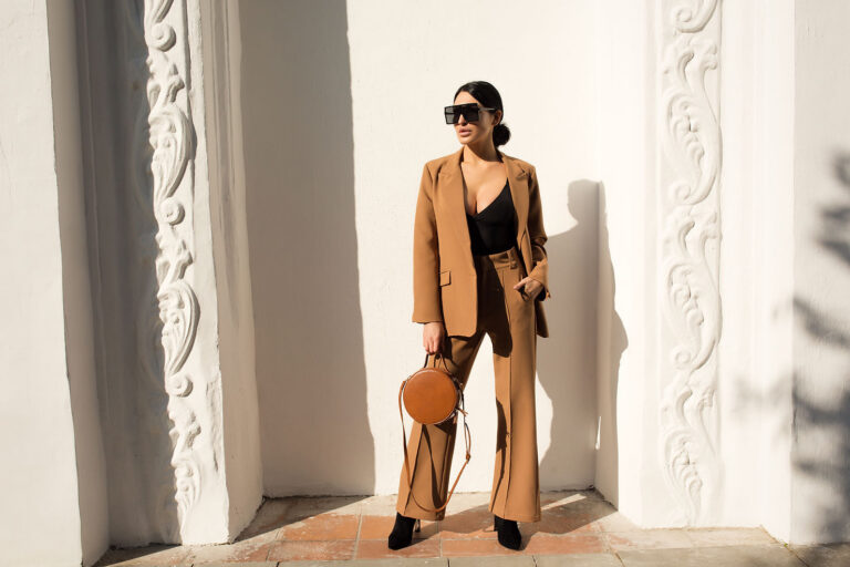 trendy woman in oversized sunglasses