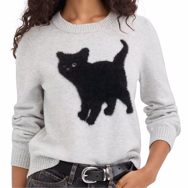 gray sweater with a black cat