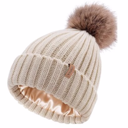 Beige beanie with pom pom