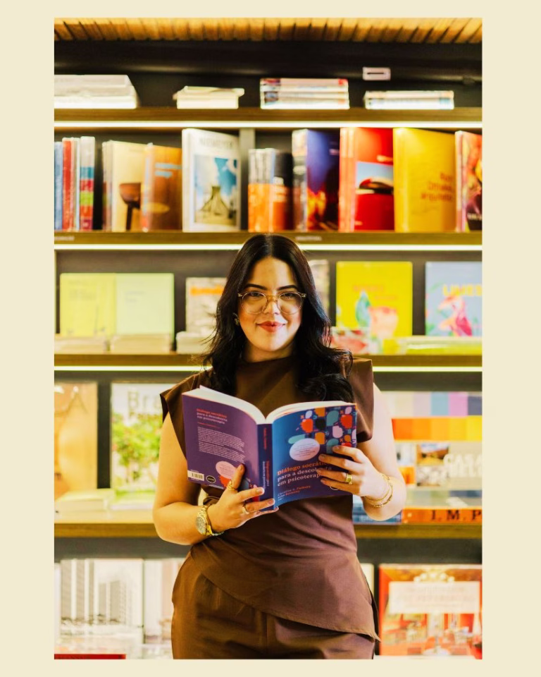 woman reading new book in bookstore