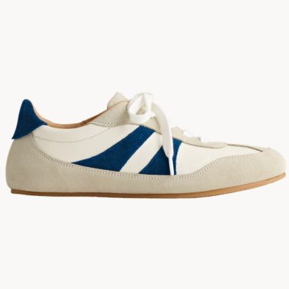 slim white and blue sneaker