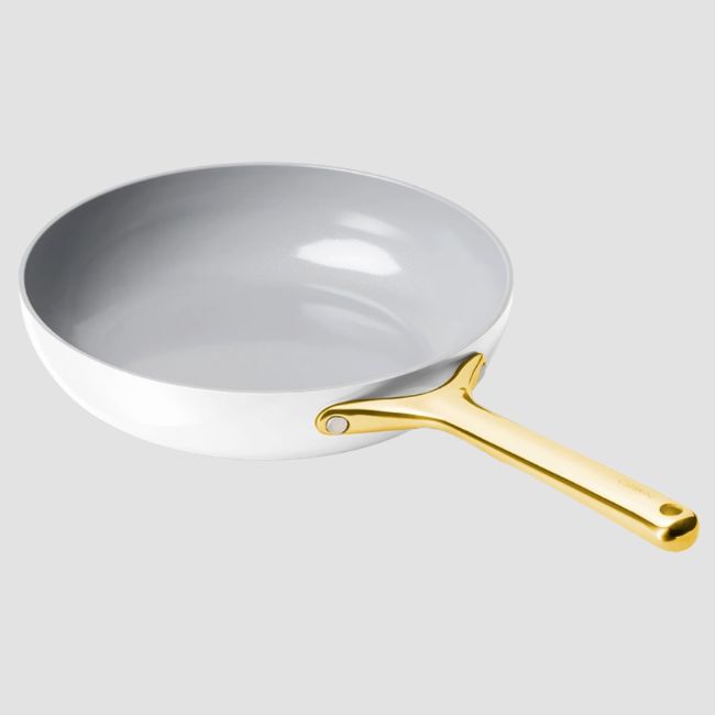 white and gold fry pan