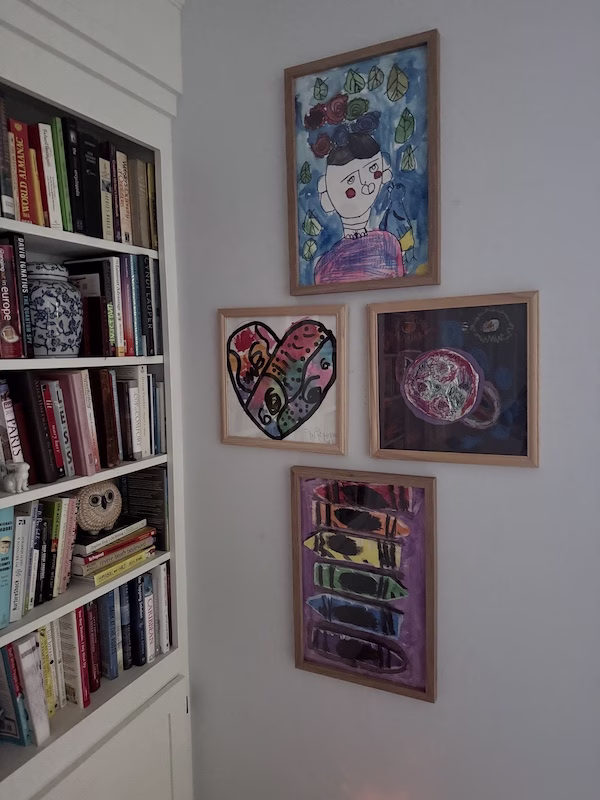 Children's Framed Wall Art next to a built in bookcase