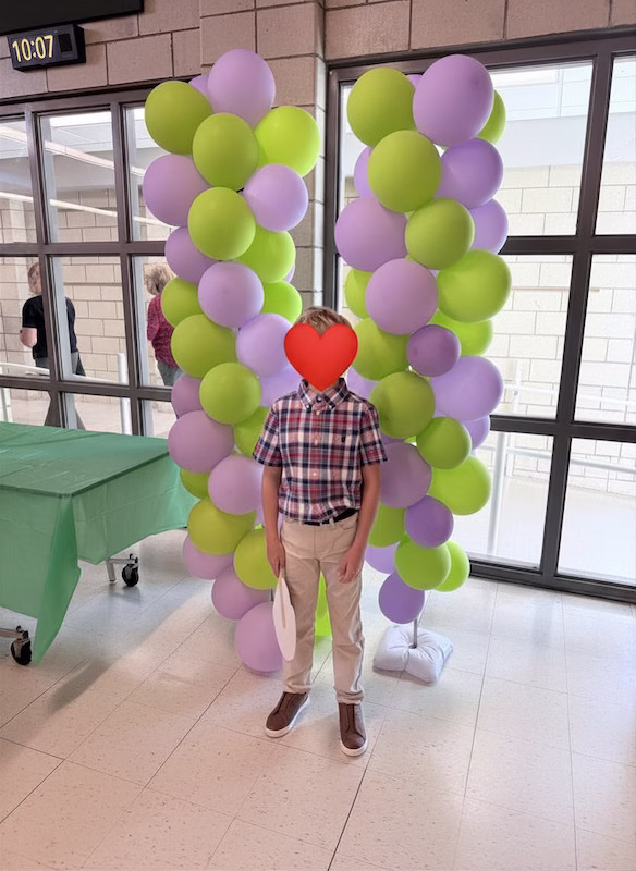 fifth grade graduation with purple and green balloons