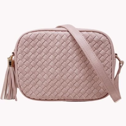 pink woven small crossbody bag that looks like Clare V.