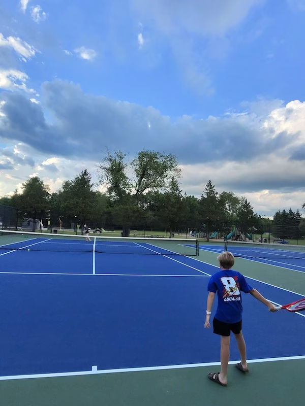 playing tennis in the park