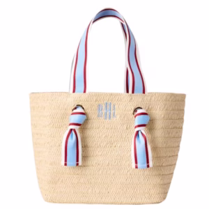 straw tote with red, white and blue handle