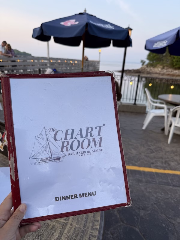 the chart room dinner menu with beautiful fisherman bay in the background