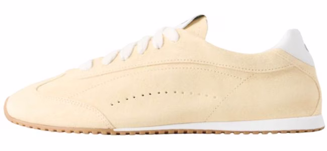 yellow alo sneakers for summer trips