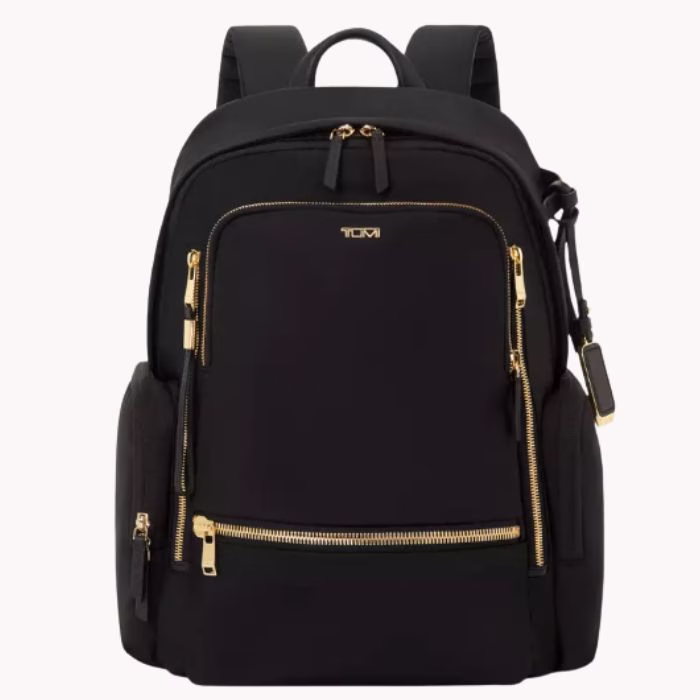 black tumi backpack with gold details