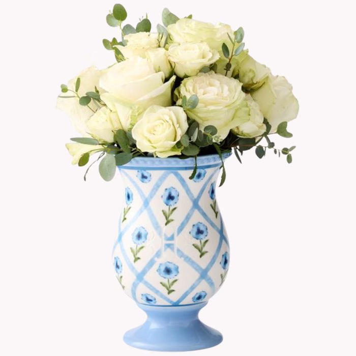 blue and white vase with flowers