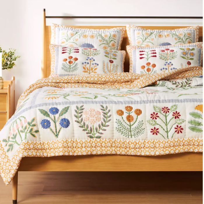 floral yellow trimmed quilt