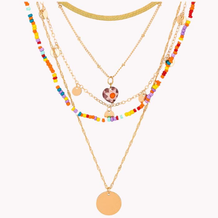 gold layered necklace with beads and charms