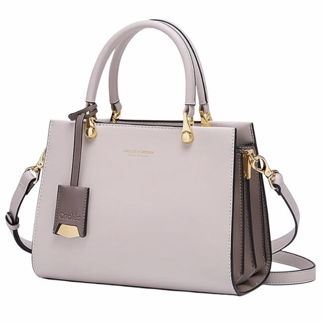 light pink structured leather top handle purse