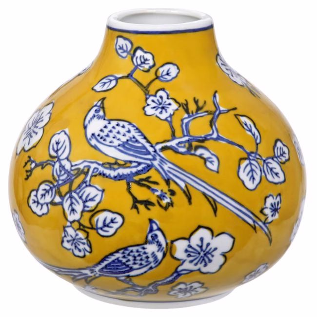 mustard yellow vase with blue and white bird motif