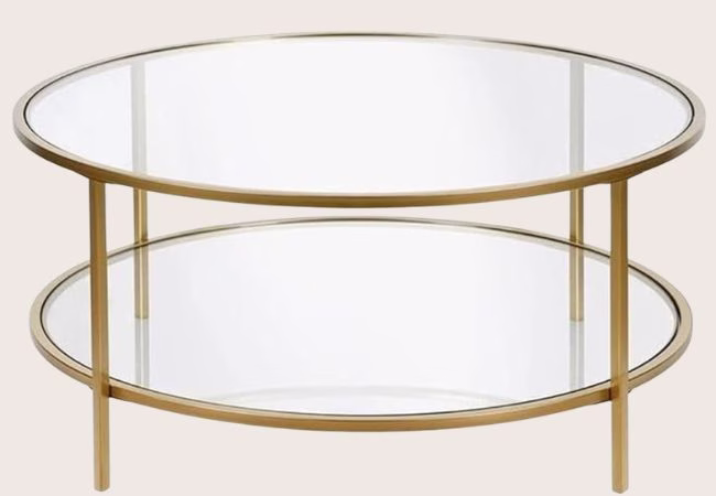 round two tiered coffee table with gold and glass