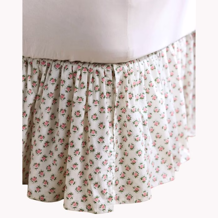ruffled bed skirt with little pink flowers