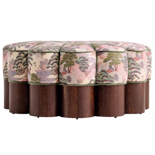 sculptural ottoman with brown base and floral top