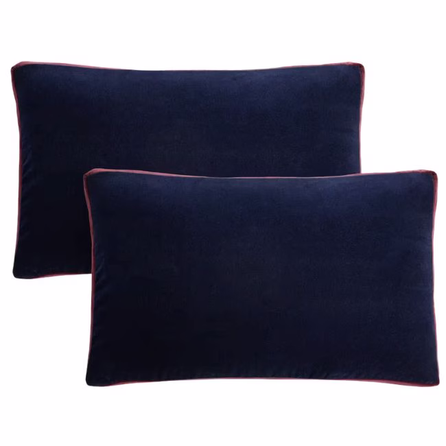 set of navy rectangular throw pillows