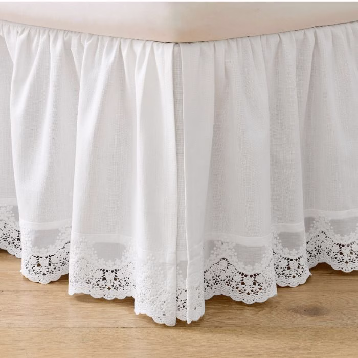 white bed skirt with lacy edge