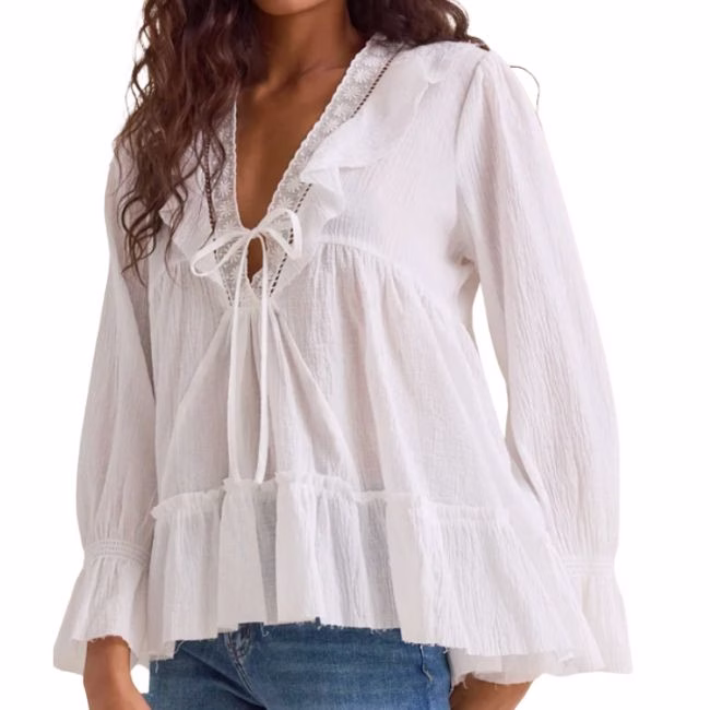 white romantic blouse with ruffles