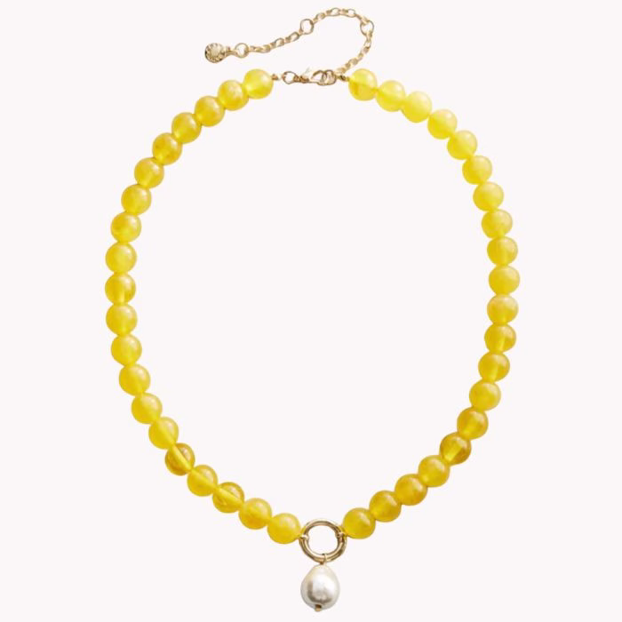yellow bead necklace with a pearl charm