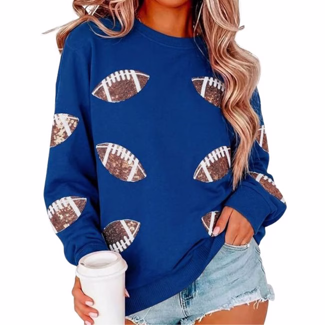 blue sweatshirt with footballs