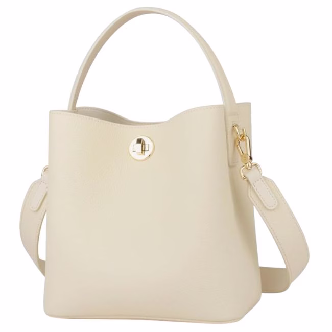 white crossbody bucket bag with a top handle and long strap