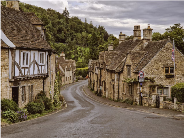 english countryside with old homes and green hills
