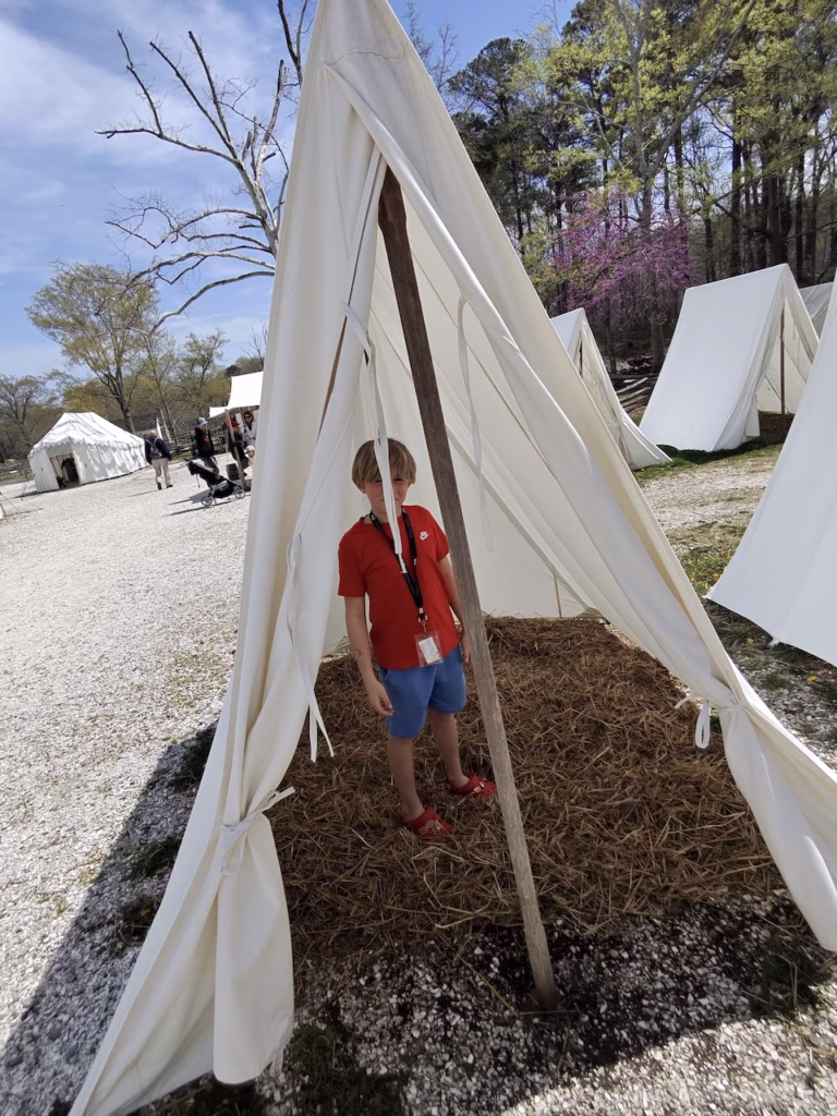 Standing inside a tent at the continental army encampment