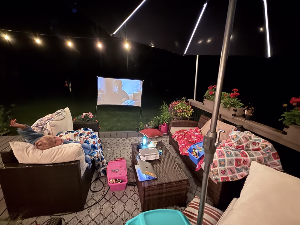 outdoor movie night with string lights