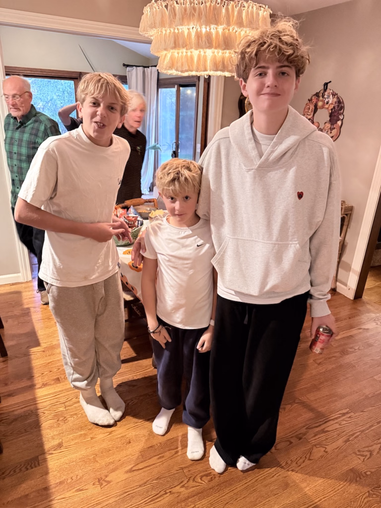 boys at a pumpkin carving party