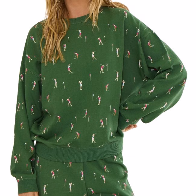 green sweatshirt with golfers